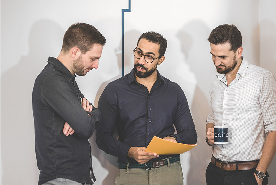 Ipanova consultants discussing a project — SAP expertise and custom applications
